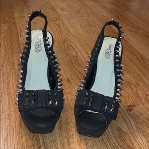 Studded black platforms sling backs